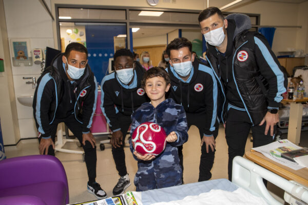 Reading FC players and staff hand out gifts while they visit the childrens ward at The Royal Berkshire Hospital in Reading.