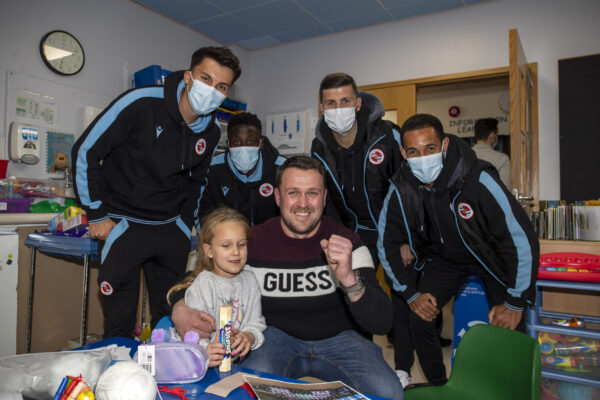 Reading FC players and staff hand out gifts while they visit the childrens ward at The Royal Berkshire Hospital in Reading.