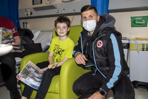 Reading FC players and staff hand out gifts while they visit the childrens ward at The Royal Berkshire Hospital in Reading.